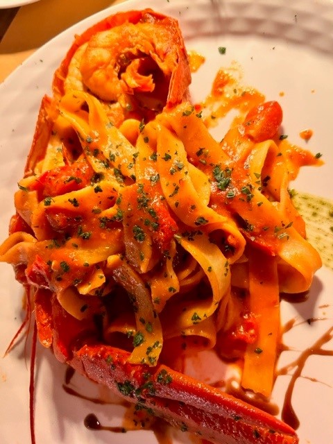 Photo of pasta with lobster