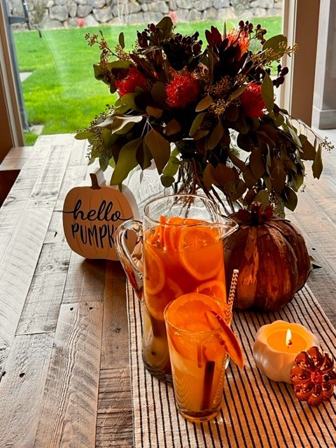 Image of flowers and a pitcher of fall sangria